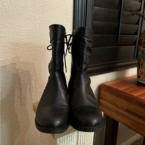 Women black leather boots in excellent condition. Worn by me only once.